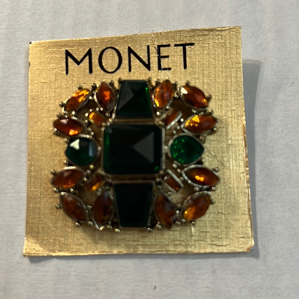 Monet signed emerald and amber topaz looking brooch pin.Beautiful piece of art